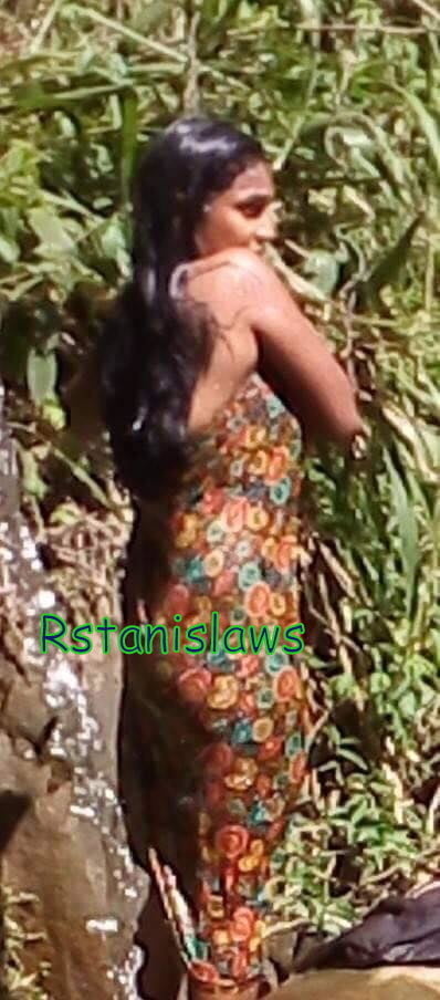 Sri lankan girls bathing outdoor
 #80867325