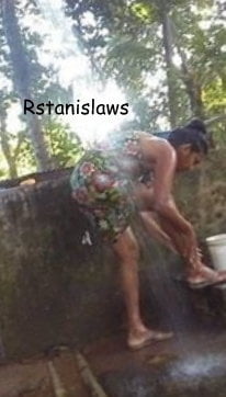 Sri lankan girls bathing outdoor
 #80867329