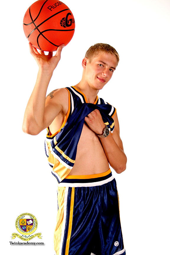 Blond teenage Latvian hunk poses in his basketball uniform #106930053