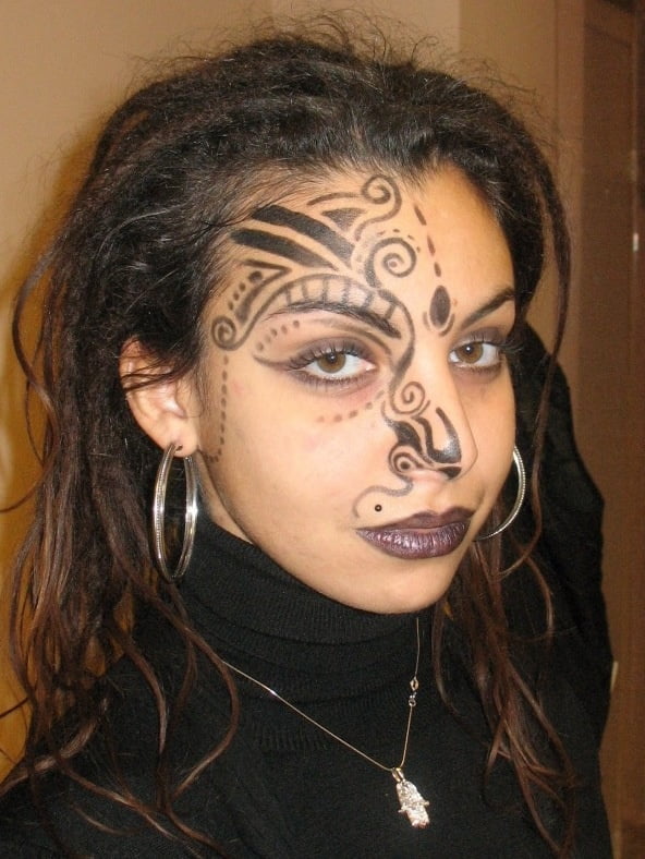 Face tattoo women. #91270493