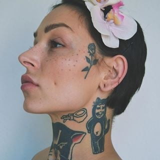 Face tattoo women. #91270958