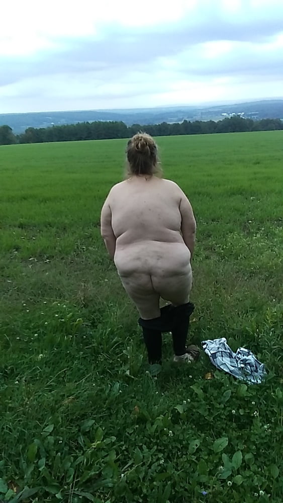 naked in a field #107223797