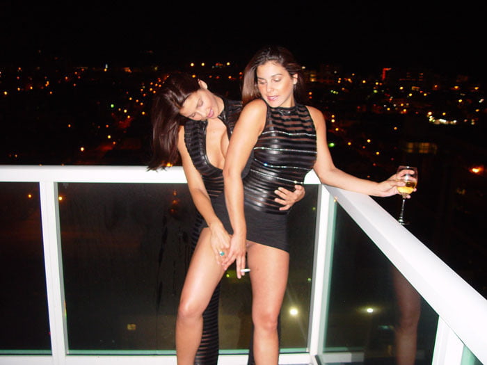 Late Night Brunette Love on a Balcony #82316590