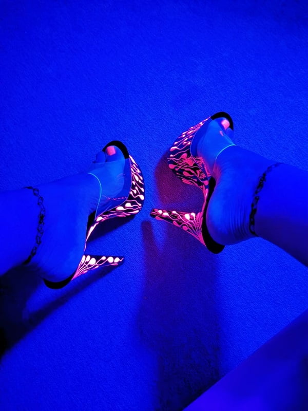 Sexy CD Feet On High Heels Posing In Neon Light #106886996