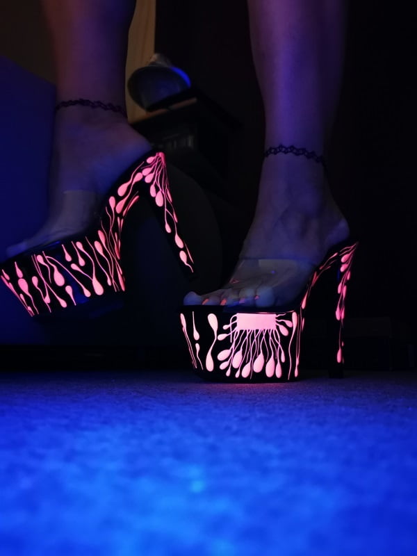 Sexy CD Feet On High Heels Posing In Neon Light #106887012