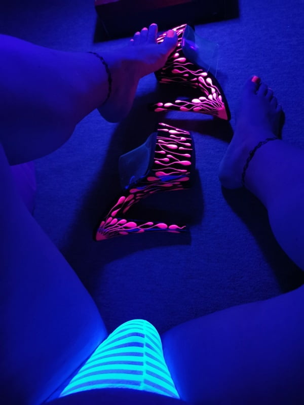 Sexy CD Feet On High Heels Posing In Neon Light #106887024