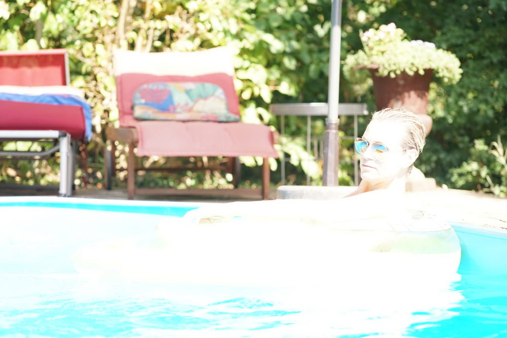 Mature Floating Topless In the Pool #94215475