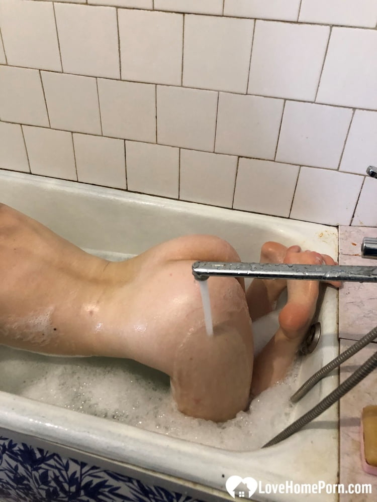 Fooling around for a bit in my bathtub #106850578