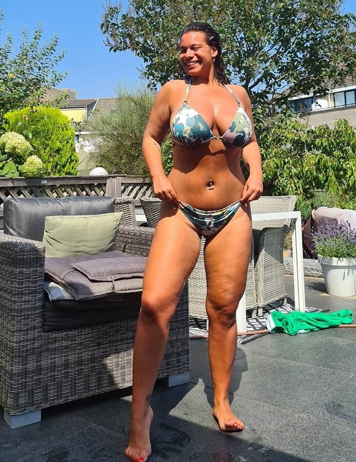 Amateur Dutch nurse Cheryl with huge tits in bikini pic picture