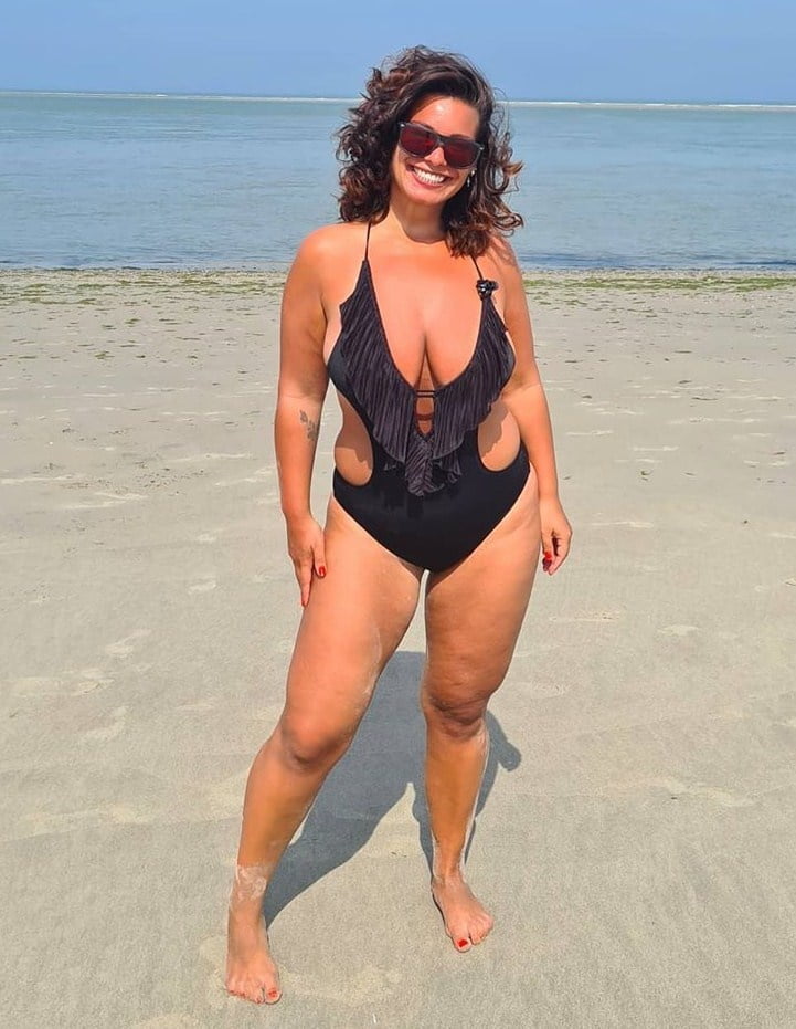 Amateur Dutch nurse Cheryl with huge tits in bikini image
