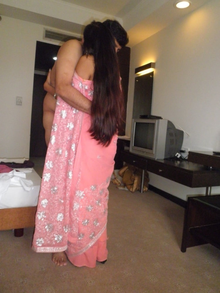 srilankan principale and teacher in hotel room #105382837