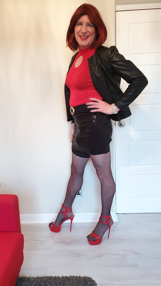 Leather-basically basically based mostly jacket and purple sissy chastity for TGirl Lucy